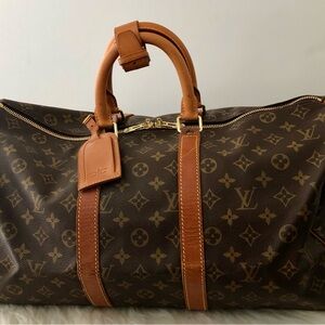 100% Authentic Louis Vuitton Keepall 45 bandonliere duffle travel bag